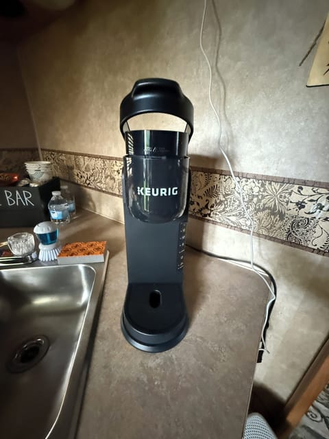 Convenient Keurig coffee maker, perfect for brewing a quick cup anytime.