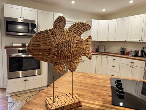 Charming kitchen with modern appliances and unique decor, ideal for culinary adventures and entertaining.