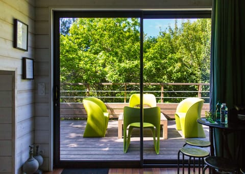 A bird's-eye view of nature, fully immersive, with a lovely terrace to enjoy.