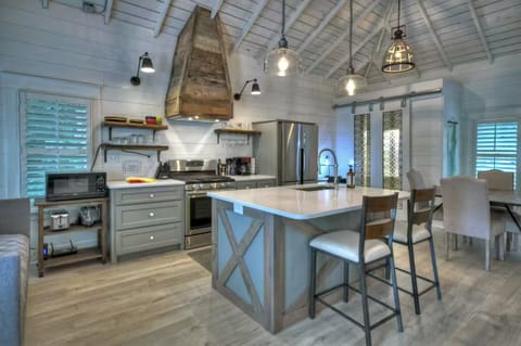 Pantry storage in corner behind sliding doors