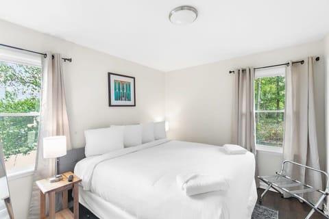 Minimalist Bedroom with tall windows