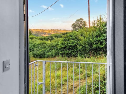 Looking out from the coach house kitchen | The Coach House - Sprytown Cottages, Lifton