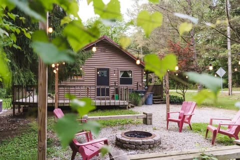 Cozy up around the fire pit under twinkling string lights . Surrounded by nature, this outdoor area is perfect for roasting marshmallows, sharing stories, and making memories beneath the stars ✨