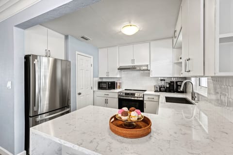 Kitchen with great work space be it a casual fair or a gourmet feast.