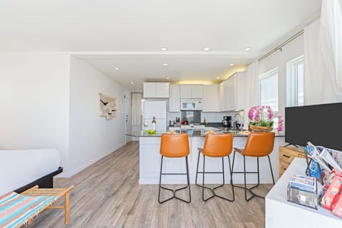 Pull up a seat at the kitchen counter—perfect for casual dining, morning coffee, or keeping the chef company! (Cayucan Bungalow 330)