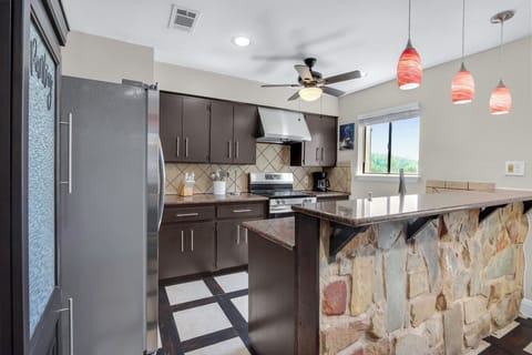 Custom stone work on the kitchen bar top