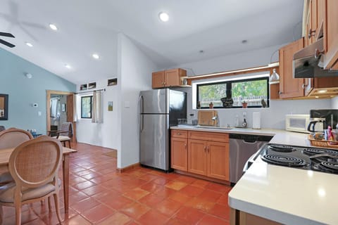 Large kitchen stocked with stainless steel appliances