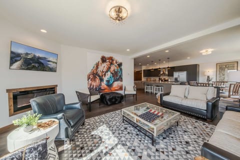 Bright living area with ample seating, stunning views, and Smart TV