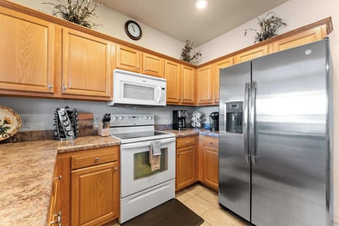 The inviting kitchen offers ample space & every home comfort