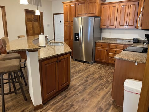 Kitchen with stainless steel appliances and granite countertops