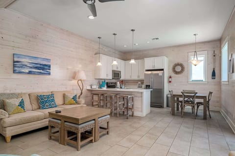 Open concept kitchen, living and dining area.
