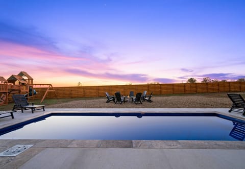 Another angle shows off the clean, sleek design of the pool and its relaxing views of the surrounding landscape.