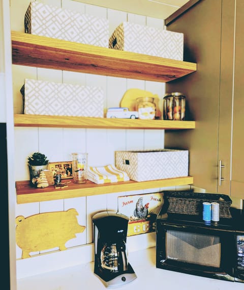 Kitchen is stocked with everything you need. Keurig, coffee maker & microwave.