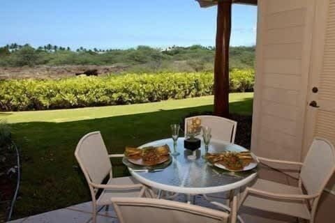Enjoy al fresco meals on your private patio, with panoramic views of lava fields and beautiful greenery.