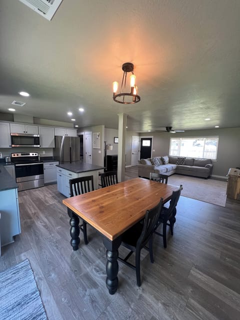 Comfortable seating for the whole group. Five chairs at the table, two barstools