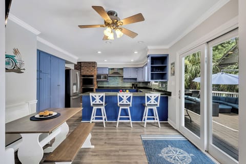 Kitchen has direct access to the back pool deck