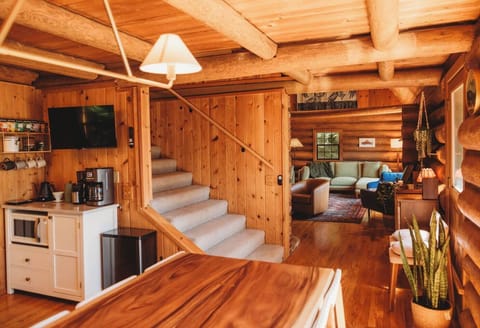 A coffee bar with a full selection of teas, hot chocolate, and locally roasted coffee beans provided, as well as a Smart TV!