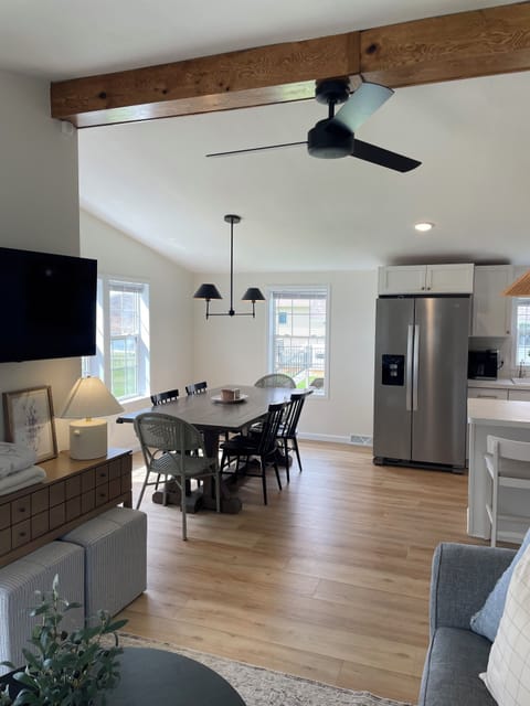 Open concept kitchen, living and dining room with views of beautiful Swan Lake