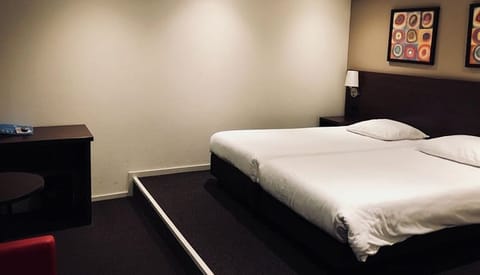 Unit with 2 Single beds. Exact unit will be assigned upon arrival. Views, colors, and decor may vary.