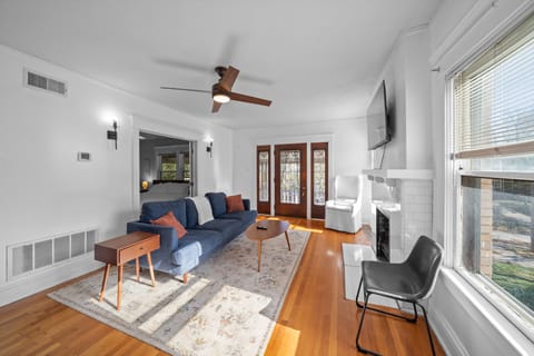Bright and welcoming living area with comfortable seating, natural light, and space to relax after a day out.