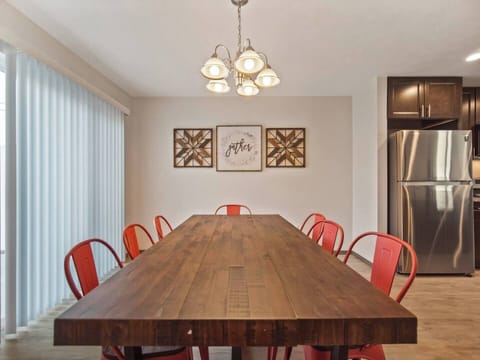 Off the dining room is the back door to the parking pad.