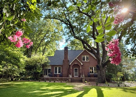 Enjoy shade and breeze on the front porch rockers. 
Peep the deer crossing too!