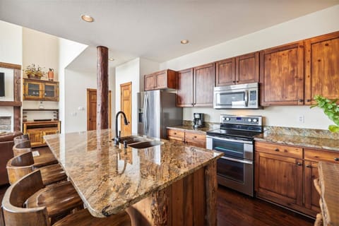 Fully Equipped Kitchen with Granite Countertops