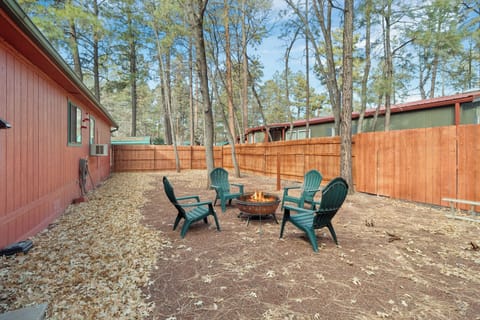 Your pups will love the fully fenced-in backyard for safe play.
