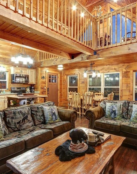 	•	Cozy lighting throughout, including a warm chandelier overhead