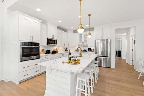 Chef Inspired Kitchen: Quartz countertops, premium cabinetry