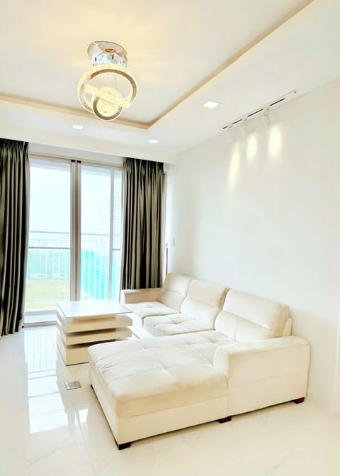 Living Room, with balcony facing golf, canal river, parks, pine trees