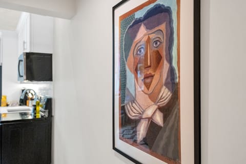 Eclectic local artwork adds a touch of personality and charm to your stylish stay.