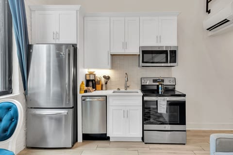 Modern appliances and all the essentials for home-cooked meals.