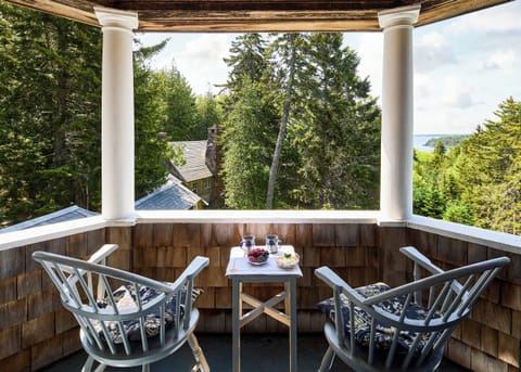 Private porch off Master bedroom with views down to the Lodge & of the ocean