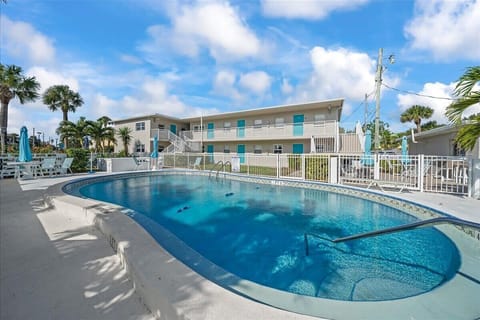 Shared pool right outside your front door.