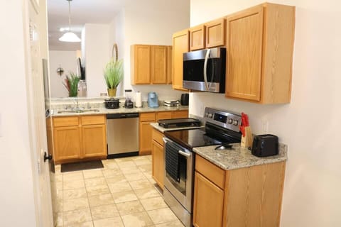 Bright and fully equipped kitchen with modern appliances and plenty of counter space, perfect for preparing meals during long-term stays. Close to shopping at Woodbridge Crossing and local grocery stores.

