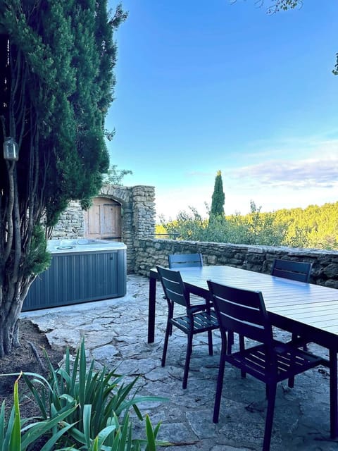 Terrace with Jacuzzi and dining table