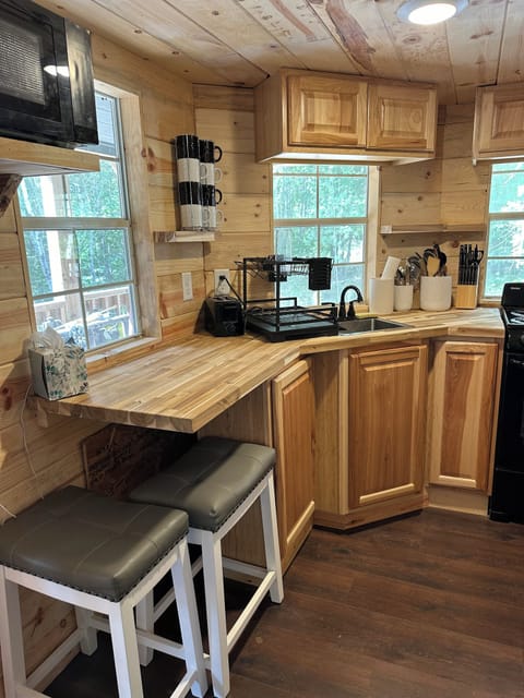 Charming two-seat nook, perfect for coffee or meals