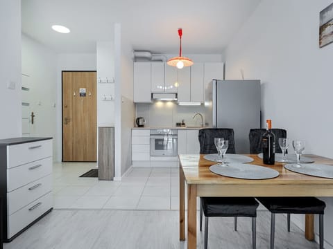 Living Room with Sofa Bed, Smart TV and Dining Table | Book Now with RENTUJEMY.COM