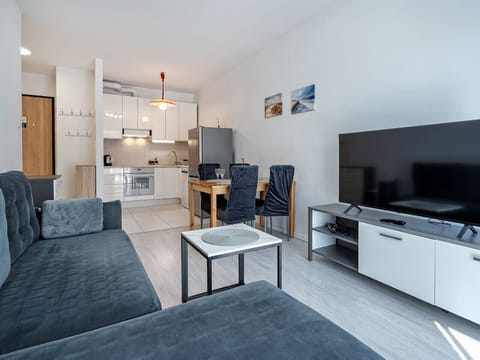 Living Room with Sofa Bed, Smart TV and Dining Table | Book Now with RENTUJEMY.COM