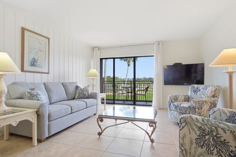 Step into the bright, inviting living room of this two-bedroom Plantation Club villa, where natural light and an easy coastal feel immediately set the tone for relaxed Sea Pines living.