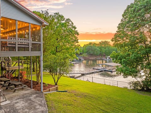 Take in a sunset on Smith lake from the Dock, Covered Patio or fully fenced yard