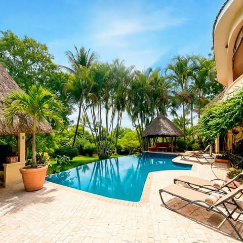 Covered outdoor living space perfect for morning coffee or evening drinks