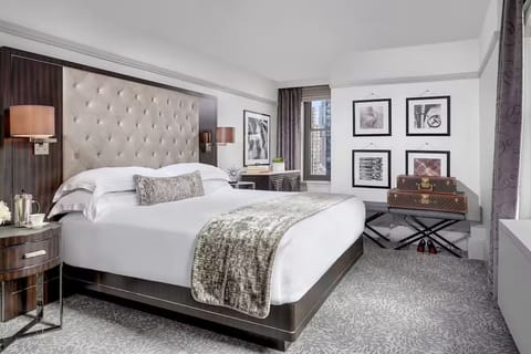Sink into crisp linens and enjoy a plush, serene bedroom.