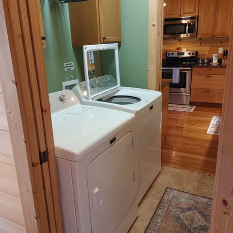 Full laundry with detergent provided (as well as iron and board)