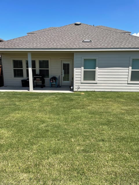 Back yard patio with grill