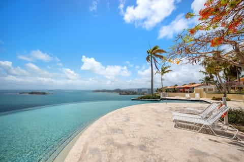 Infinity pool , beachfront views with tanning beds