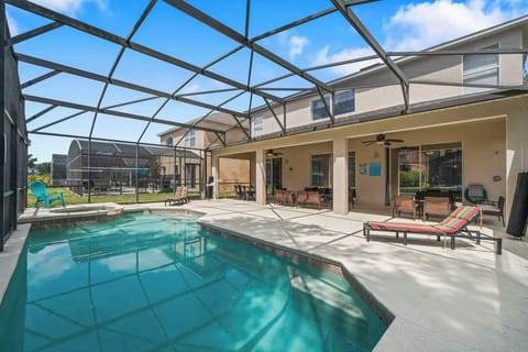 Relax under the sun in your private pool surrounded by a clean, open patio perfect for family fun.