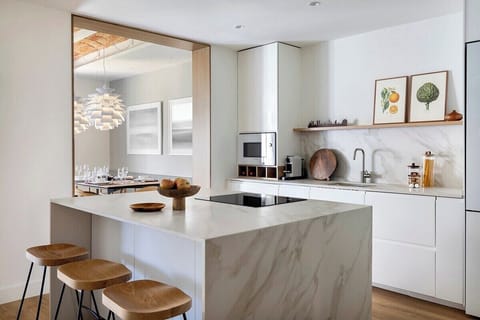 The open, modern kitchen features everything you need to create gourmet meals.