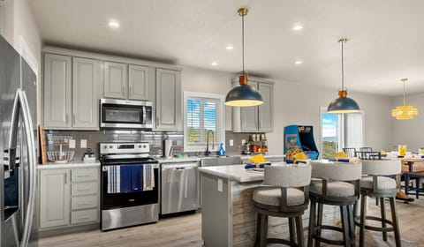 Modern kitchen with island seating, steps from Bear Lake